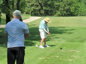 lh golf36 teeing off